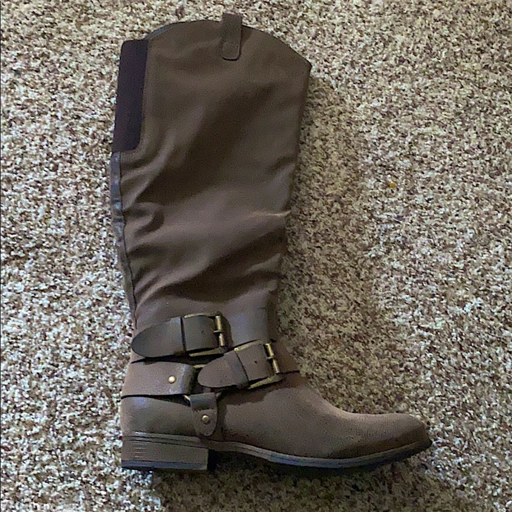 Never worn almost knee high boot